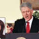 Embattled President Clinton vehemently denies having sex with former
White House intern Monica Lewinsky (inset), calling it "so much more
than that."